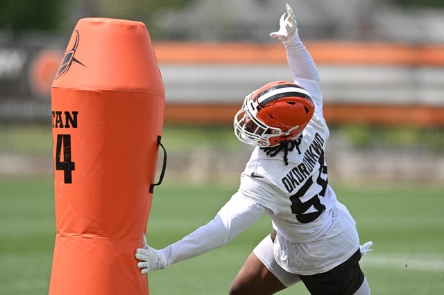 Jun 10, 2025; Berea, OH, USA; Cleveland Browns defensive end Ogbo Okoronkwo (54) uns a drill during minicamp at CrossCountry Mortgage Campus. Mandatory Credit: Ken Blaze-Imagn Images
