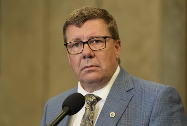 Saskatchewan Premier Scott Moe speaks with media following a meeting with the prime minister on Parliament Hill in Ottawa, Tuesday, Sept. 16, 2025. THE CANADIAN PRESS/Adrian Wyld