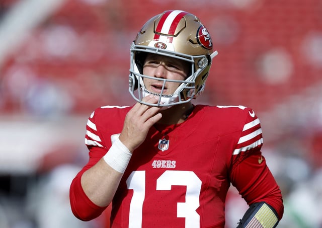 SANTA CLARA, CALIFORNIA - NOVEMBER 17: Brock Purdy #13 of the San Francisco 49ers looks on during warmups before a game against the Seattle Seahawks at Levi's Stadium on November 17, 2024 in Santa Clara, California. Brock Purdy's game status could be in jeopardy as the quarterback left practice early.