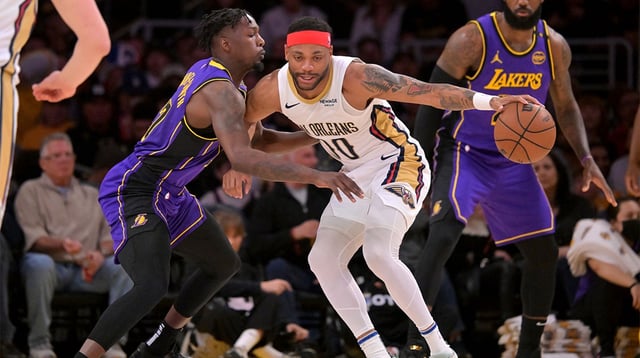 Apr 4, 2025; Los Angeles, California, USA; Los Angeles Lakers forward Dorian Finney-Smith (17) guards New Orleans Pelicans forward Bruce Brown (00) in the first at Crypto.com Arena. Mandatory Credit: Jayne Kamin-Oncea-Imagn Images