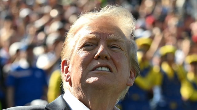 FARMINGDALE, NEW YORK - SEPTEMBER 26: U.S. President Donald Trump attends the 2025 Ryder Cup at Black Course at Bethpage State Park Golf Course on September 26, 2025 in Farmingdale, New York. In his second term, Trump has attended several major sporting events.  (Photo by Mandel Ngan-Pool/Getty Images)