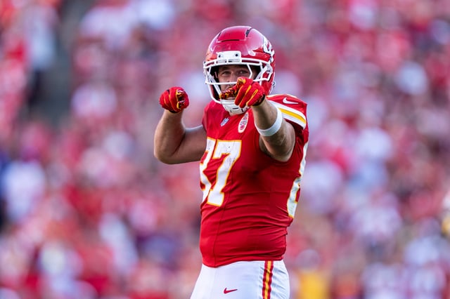 Travis Kelce #87 of the Kansas City Chiefs reacts after a run during an NFL football game against the Baltimore Ravens at GEHA Field at Arrowhead Stadium on September 28, 2025 in Kansas City, Missouri