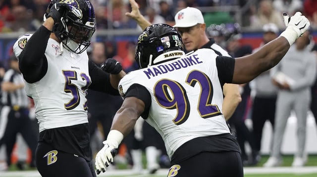 Dec 25, 2024; Houston, Texas, USA; Baltimore Ravens defensive tackle Nnamdi Madubuike (92) celebrates linebacker Kyle Van Noy (53) sack against Houston Texans quarterback C.J. Stroud (7) (not pictured) in the first quarter at NRG Stadium. Mandatory Credit: Thomas Shea-Imagn Image