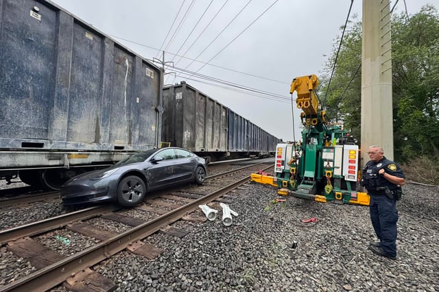 A Pennsylvania towing company was called to assist Sinking Spring Borough and Western Berks Fire Department moving a Tesla that had come to rest on active railroad tracks.
