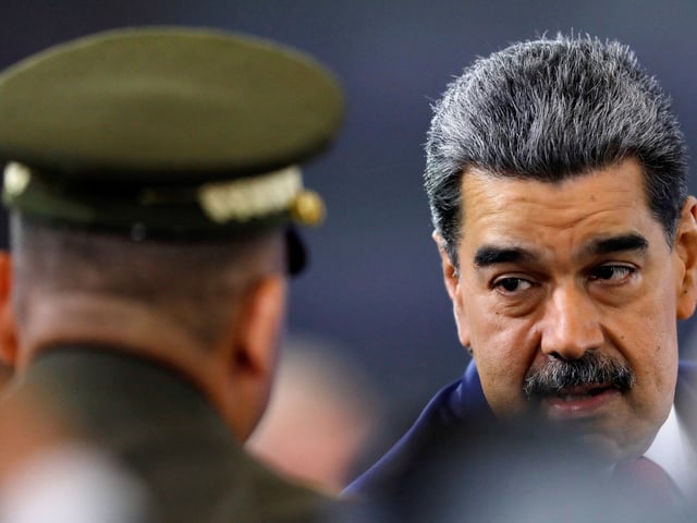 Venezuela's President Nicolas Maduro attends a press conference, days after he said Venezuela would deploy military, police and civilian defenses at 284 "battlefront" locations across the country, amid heightened tensions with the U.S., in Caracas, Venezuela, September 15, 2025. REUTERS/Leonardo Fernandez Viloria