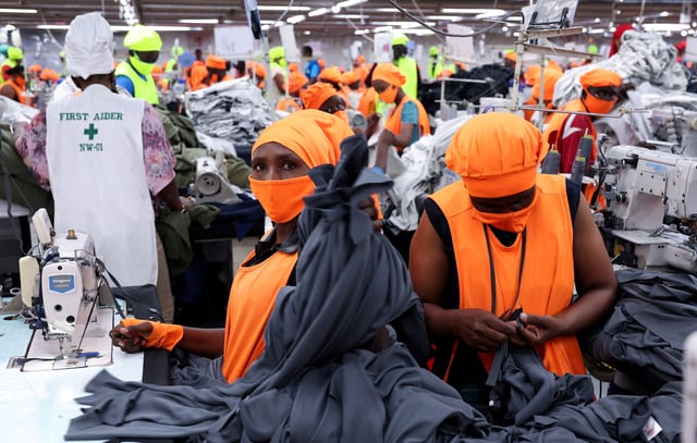 Kenyan workers prepare clothes for export at the New Wide Garment Export Processing Zone (EPZ) factory operating under the U.S. African Growth and Opportunity Act (AGOA), in Kitengela, Kajiado County Kenya September 19, 2025. REUTERS/Monicah Mwangi/File Photo