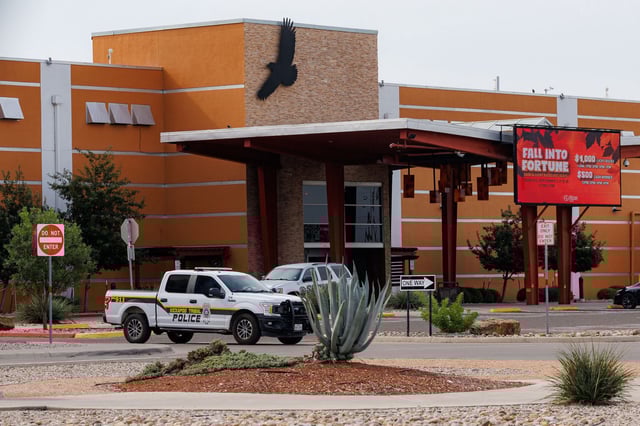 Security and police vehicles surround the entrance to Kickapoo Lucky Eagle Casino in Eagle Pass on Monday, Sept. 29, 2025. Two people were killed, and five others were injured in a shooting at the casino late Saturday night.