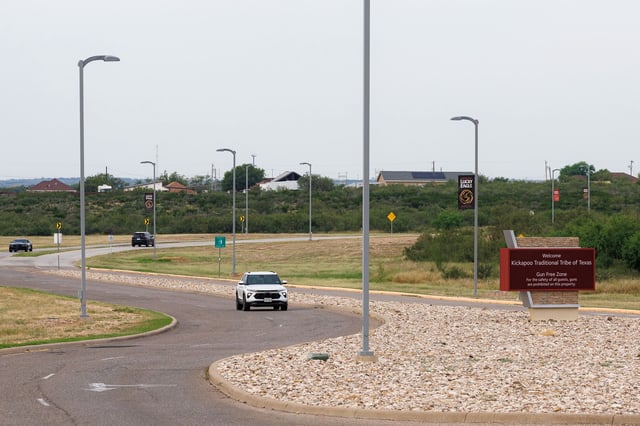 A sign welcoming visitors to Kickapoo Lucky Eagle Casino and declaring the area a “gun-free zone” in Eagle Pass is pictured on Monday, Sept. 29, 2025. Two people were killed and five others were injured in a shooting at the casino late Saturday night.