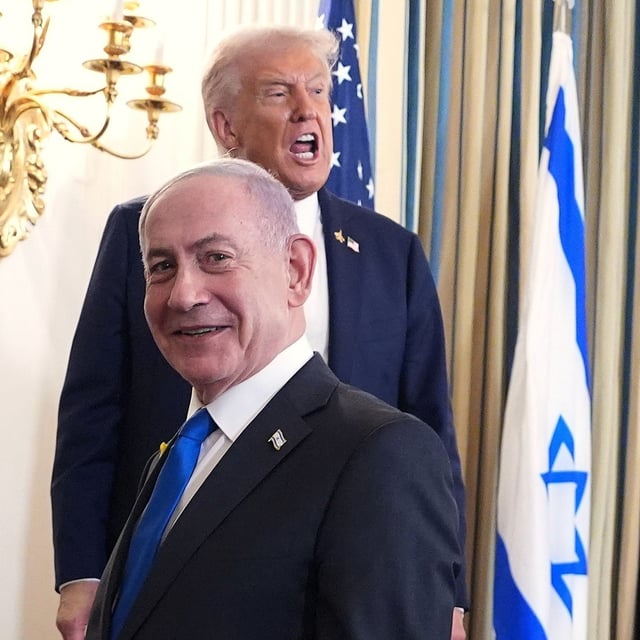 President Donald Trump speaks upon departing a news conference with Israeli Prime Minister Benjamin Netanyahu, in foreground, in the State Dining Room of the White House, Monday, Sept. 29, 2025, in Washington. (AP Photo/Evan Vucci)