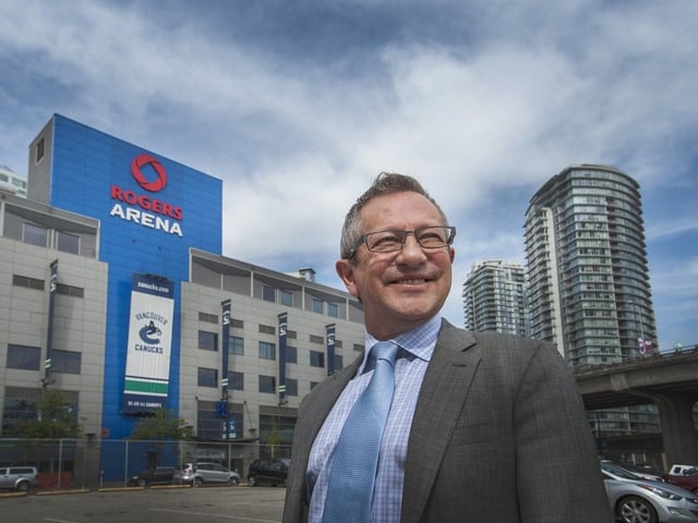 Former Vancouver Canucks owner Arthur Griffiths stands near Rogers Arena in Vancouver on August 27, 2015. 