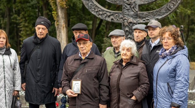 Descendants of a Babyn Yar survivor gather at the memorial site during the 84th anniversary commemoration of the Nazi massacre of Jews near Kyiv, Sept. 28, 2025. (Theia Chatelle)