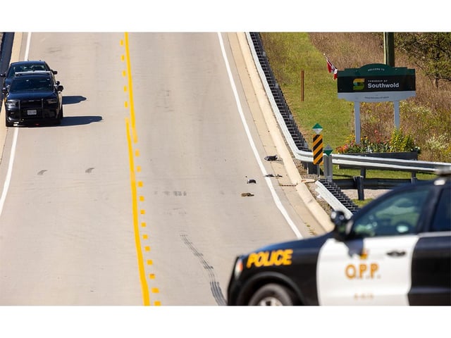 A shoe and parts of a vehicle lay strewn on John Wise Road after a serious crash involving a pick-up truck on Monday, Sept. 29, 2025. (Mike Hensen/The London Free Press) 