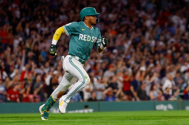 Boston's Ceddanne Rafaela (3) reacts to hitting an RBI triple in the ninth inning of a baseball game against the Detroit Tigers, Friday, Sept. 26, 2025, in Boston. (AP Photo/Greg M. Cooper)