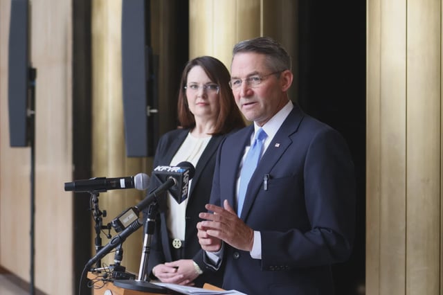 Attorney General Drew Wrigley and Chief Deputy Attorney General Claire Ness talk to reporters June 11, 2025, about an opinion related to Gov. Kelly Armstrong’s veto. (Mary Steurer/North Dakota Monitor)