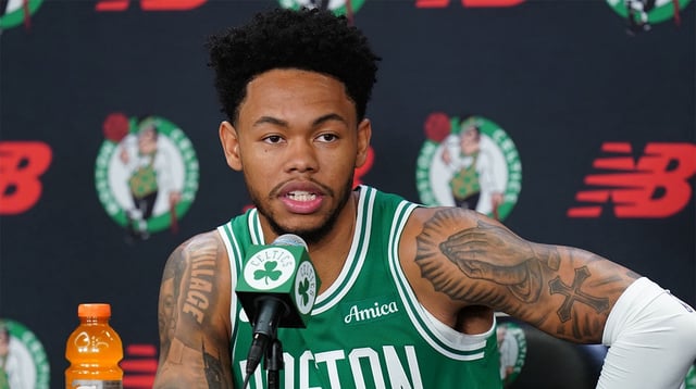 Sep 29, 2025; Boston, MA, USA; Boston Celtics guard Anfernee Simons (4) talks with reporters during media day at the Auerbach Center. Mandatory Credit: David Butler II-Imagn Images