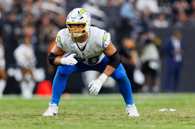 LAS VEGAS, NEVADA - SEPTEMBER 15: Joe Alt #76 of the Los Angeles Chargers gets set during the second half of an NFL football game against the Las Vegas Raiders at Allegiant Stadium on September 15, 2025 in Las Vegas, Nevada. (Photo by Brooke Sutton/Getty Images)