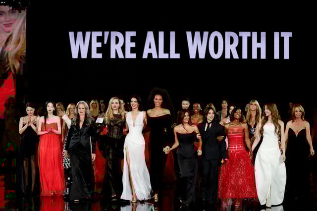 L'Oreal ambassadors react at the end of the public show named "Liberty, Equality, Sisterhood. Because You're Worth It", organised by French cosmetics group L'Oreal, in front of Paris city hall as part of Paris Fashion Week, France, September 29, 2025. REUTERS/Stephanie Lecocq
