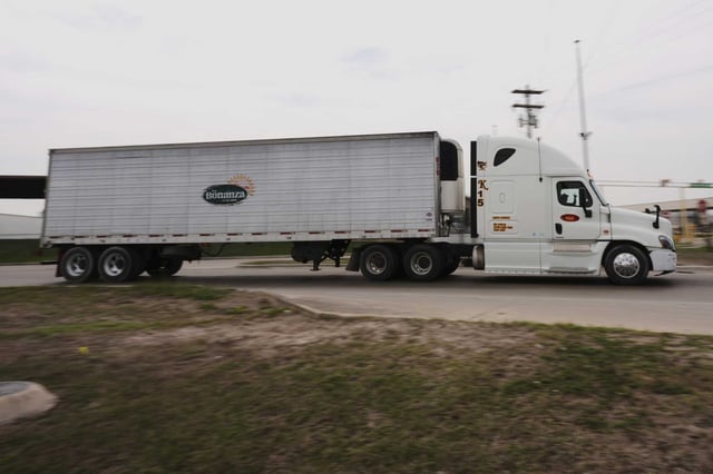 A produce truck enters the U.S. from Mexico at the Pharr International Bridge, Tuesday, March 4, 2025, in Pharr, Texas.