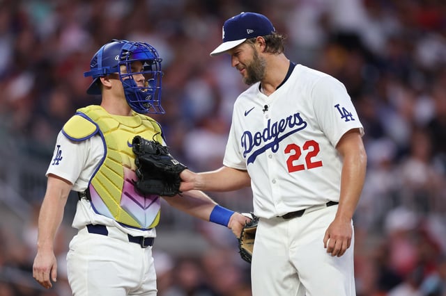 ATLANTA, GEORGIA - JULY 15: Clayton Kershaw #22 of the Los Angeles Dodgersis congratulated by Will Smith #16 after being removed from the game during the second inning of the MLB All-Star Game at Truist Park on July 15, 2025 in Atlanta, Georgia. (Photo by Jamie Squire/Getty Images)