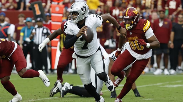 Sep 21, 2025; Landover, Maryland, USA; Las Vegas Raiders quarterback Geno Smith (7) scrambles from Washington Commanders defensive end Javontae Jean-Baptiste (90) during the third quarter at Northwest Stadium. Mandatory Credit: Geoff Burke-Imagn Images