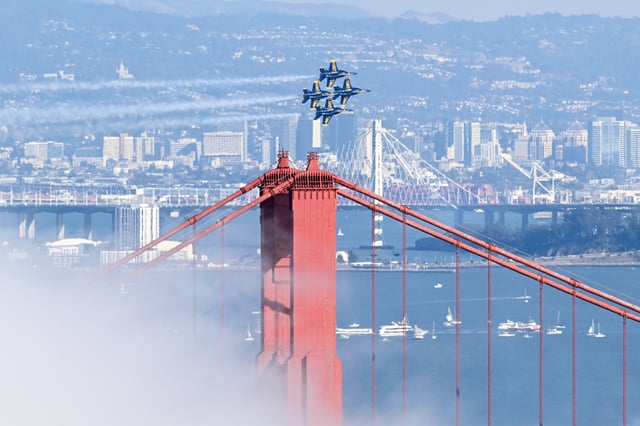 Blue Angels fly over the Golden Gate Bridge during Fleet Week Air Show in San Francisco, California on October 13, 2024.