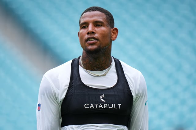 MIAMI GARDENS, FLORIDA - AUGUST 23: Darren Waller #83 of the Miami Dolphins warms up prior to a NFL Preseason 2025 game between Jacksonville Jaguars and Miami Dolphins at Hard Rock Stadium on August 23, 2025 in Miami Gardens, Florida. (Photo by Rich Storry/Getty Images)