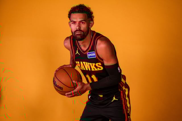 Sep 29, 2025; Atlanta, GA, USA; Atlanta Hawks guard Trae Young (11) poses for a photo at media day. Mandatory Credit: Brett Davis-Imagn Images