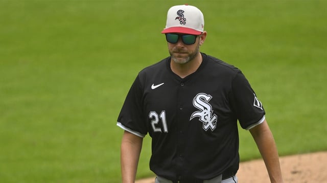 Jul 4, 2024; Cleveland, Ohio, USA; Chicago White Sox pitching coach Ethan Katz (21) walks on the field in the third inning against the Cleveland Guardians at Progressive Field. Mandatory Credit: David Richard-Imagn Images