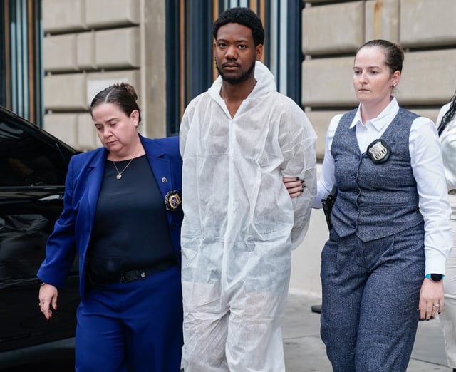 Kenneth Siridoe, 21, is escorted from the Bronx Special Victims Unit Monday, Sept. 29, 2025 in Manhattan, New York, New York. (Barry Williams/ New York Daily News)