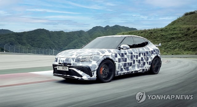 This photo provided by Genesis on Sept. 30, 2025, shows a camouflaged GV60 Magma model undergoing a performance test. (PHOTO NOT FOR SALE) (Yonhap)
