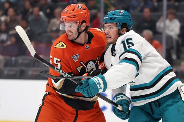 Shane Bowers #15 of the San Jose Sharks pushes Jacob Trouba #65 of the Anaheim Ducks during the first period of a pre-season game at Honda Center on Sept. 29, 2025 in Anaheim, California. (Photo by Sean M. Haffey/Getty Images)