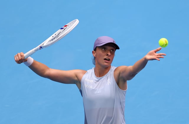Tennis - China Open - The Beijing Olympic Green Tennis Center, Beijing, China - September 27, 2025 Poland's Iga Swiatek in action during her round of 64 match against China's Yue Yuan REUTERS/Tingshu Wang