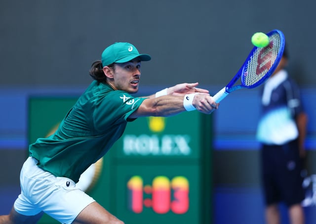 Tennis - China Open - The Beijing Olympic Green Tennis Center, Beijing, China - September 30, 2025 Australia's Alex de Minaur in action during his semi final match against Italy's Jannik Sinner REUTERS/Tingshu Wang