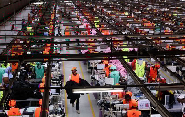 Kenyan workers prepare clothes for export at the New Wide Garment Export Processing Zone (EPZ) factory operating under the US African Growth and Opportunity Act (AGOA), in Kitengela, Kajiado County, Kenya on September 19, 2025.