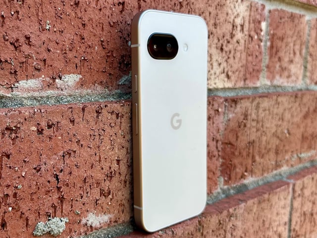 The Google Pixel 9a sitting atop a brick chimney.