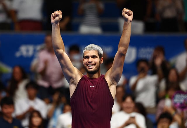 Tennis - ATP 500 - Japan Open Tennis Championships - Ariake Coliseum, Tokyo, Japan - September 30, 2025 Spain's Carlos Alcaraz celebrates winning the final against Taylor Fritz of the U.S. REUTERS/Issei Kato