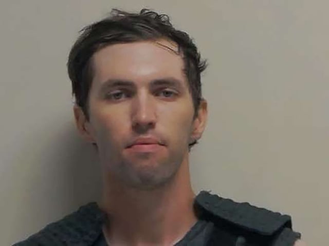 Tyler Robinson stands for a booking photo on September 12, 2025 in Spanish Fork, Utah.
