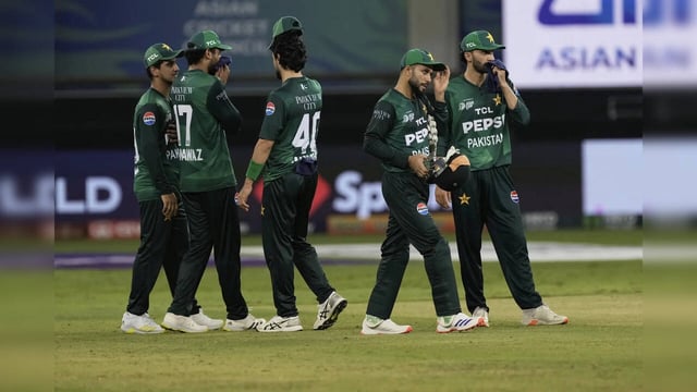 Pakistan players react after their loss in the Asia Cup cricket match against In...