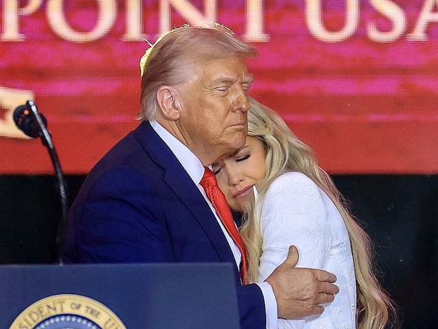 Erika Kirk joins U.S. President Donald Trump onstage during the memorial service for political activist Charlie Kirk at State Farm Stadium in Glendale, Ariz., on Sept. 21, 2025.