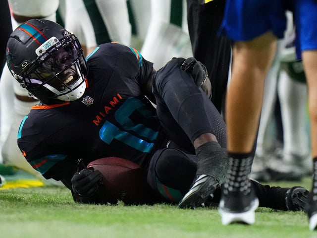 Sep 29, 2025; Miami Gardens, Florida, USA; (editors note: graphic image) Miami Dolphins wide receiver Tyreek Hill (10) injuries his leg against the New York Jets during the second half at Hard Rock Stadium. Mandatory Credit: Rich Storry-Imagn Images