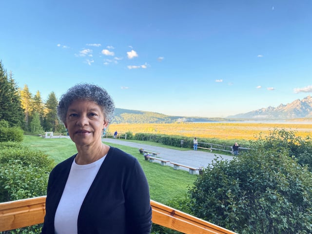 Federal Reserve Bank of Boston President Susan Collins stands behind the Jackson Lake Lodge in Jackson Hole, where the Kansas City Fed holds its annual economic symposium, in Wyoming, U.S., August 24, 2023. REUTERS/Ann Saphir