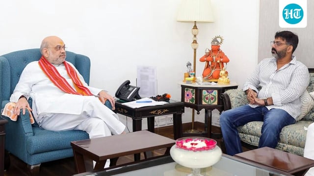 Actor and Singer Pawan Singh meets home minister and senior BJP leader Amit Shah in New Delhi on Tuesday. 