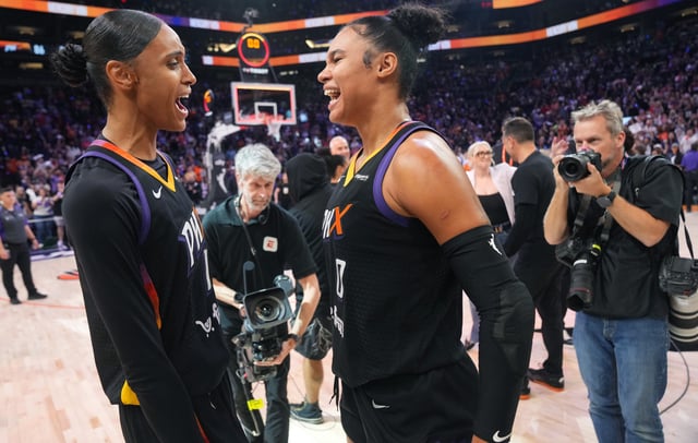 Phoenix Mercury teammates Satou Sabally (0) and DeWanna Bonner (14) celebrate their 86-81 WNBA semifinal playoff series win over the Minnesota Lynx at PHX Arena on Sept. 28, 2025.