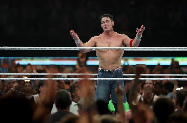 EAST RUTHERFORD, NEW JERSEY - AUGUST 03: John Cena takes a moment to salute the fans after the loss to Cody Rhodes during the WWE 2025 SummerSlam at MetLife Stadium on August 03, 2025 in East Rutherford, New Jersey. (Photo by Elsa/Getty Images)