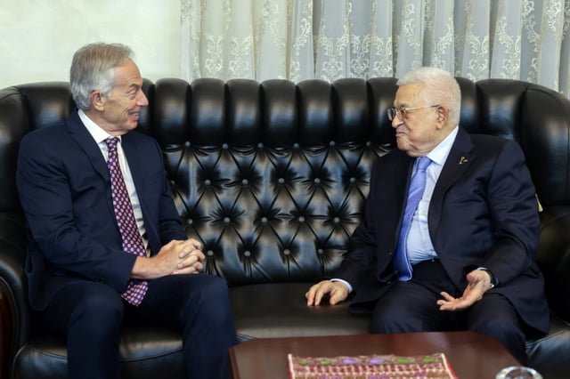 This handout picture released by the Palestinian Authority shows President Mahmud Abbas meeting with Blair in Amman in July