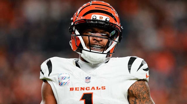 Sep 29, 2025; Denver, Colorado, USA; Cincinnati Bengals wide receiver Ja'Marr Chase (1) looks on during the third quarter against the Denver Broncos at Empower Field at Mile High. Mandatory Credit: Isaiah J. Downing-Imagn Images