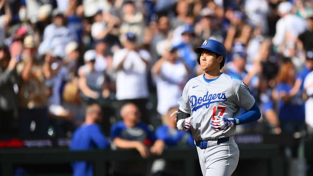 Sep 28, 2025; Seattle, Washington, USA; Los Angeles Dodgers designated hitter Shohei Ohtani (17) runs the bases after hitting a home run against the Seattle Mariners during the seventh inning at T-Mobile Park. Mandatory Credit: Steven Bisig-Imagn Images
