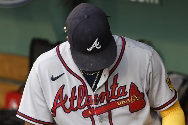 BOSTON, MA - JULY 26: The Atlanta Braves logo is seen on the jersey and hat of Ronald Acuna Jr. #13 before their game against the Boston Red Sox at Fenway Park on July 26, 2023 in Boston, Massachusetts.