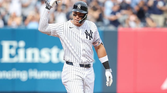 Sep 27, 2025; Bronx, New York, USA; New York Yankees right fielder Aaron Judge (99) gestures after hitting a two run single in the fifth inning against the Baltimore Orioles at Yankee Stadium. Mandatory Credit: Wendell Cruz-Imagn Images