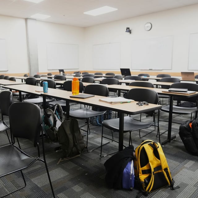 FILE - Student belongings are left behind in a classroom a day after the shooting of Charlie Kirk at Utah Valley University in Orem, Utah, Thursday, Sept. 11, 2025. (AP Photo/Lindsey Wasson)